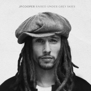 RAISED UNDER GREY SKIES