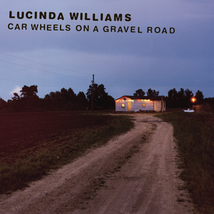CAR WHEELS ON A GRAVEL ROAD