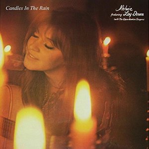 CANDLES IN THE RAIN